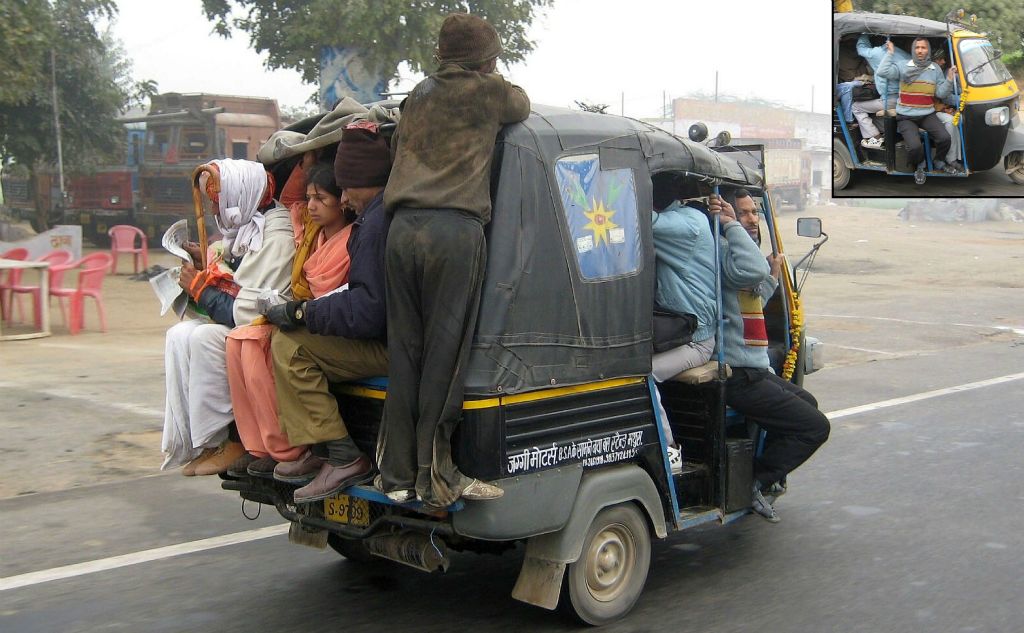 A Tuk Tuk holds two passengers and the driver. We counted fourteen people in this one.